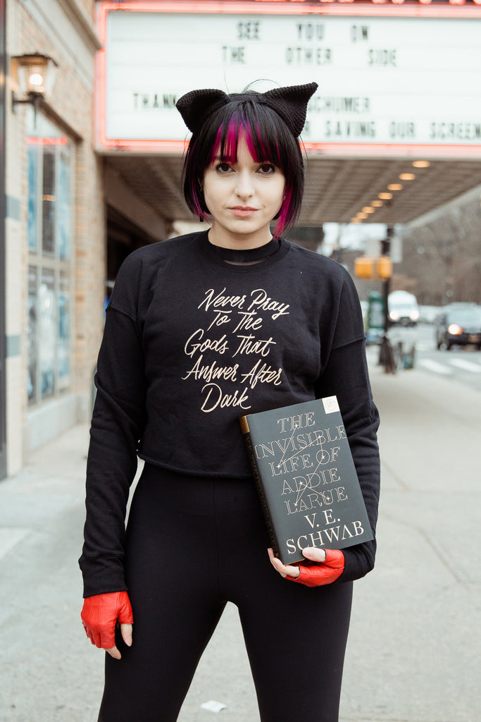 Never Pray to the Gods that Answer After Dark Fitted Crop Sweatshirt | The Invisible Life of Addie LaRue