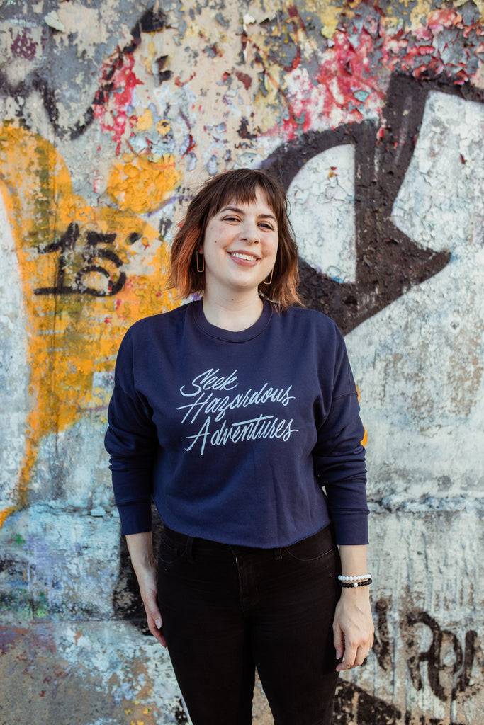 Seek Hazardous Adventures Fitted Crop Sweatshirt | The Three Musketeers
