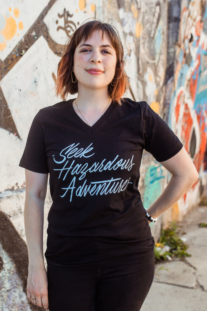 Seek Hazardous Adventures Unisex V-Neck T-Shirt | The Three Musketeers
